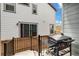 Back patio with black Blackstone grill perfect for outdoor cooking at 8586 Holman Ct # A, Arvada, CO 80005