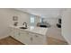 Basement wet bar with a view of the living room, perfect for entertaining and relaxation at 1148 Sunlit Dr, Castle Rock, CO 80109