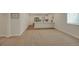 Bright basement featuring a stylish wet bar with white cabinets and modern fixtures at 1148 Sunlit Dr, Castle Rock, CO 80109
