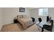 Well-lit bedroom featuring a comfy bed, modern desk, and a relaxing atmosphere at 1148 Sunlit Dr, Castle Rock, CO 80109