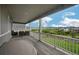 Covered patio area with comfortable seating and scenic views of the surrounding landscape at 1148 Sunlit Dr, Castle Rock, CO 80109