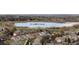 Beautiful aerial view showcasing the neighborhood pond and surrounding residential area at 2085 E 127Th Pl, Thornton, CO 80241