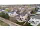 Aerial view of the property with a well-maintained yard and backyard patio at 2085 E 127Th Pl, Thornton, CO 80241