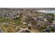 Scenic aerial view of a community park and walking trails surrounded by homes at 2085 E 127Th Pl, Thornton, CO 80241