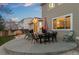 Relaxing backyard patio with a dining area, outdoor chairs, and an inviting ambiance at 2085 E 127Th Pl, Thornton, CO 80241