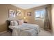 Cozy bedroom with large window and ample light at 2085 E 127Th Pl, Thornton, CO 80241