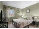 Comfortable bedroom with view to the front yard at 2085 E 127Th Pl, Thornton, CO 80241