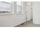 Bedroom with neutral carpet, white walls, natural light, and a closet at 6794 Merseyside Ln, Castle Pines, CO 80108