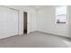 Bright, clean bedroom with large closet and view to bathroom at 6794 Merseyside Ln, Castle Pines, CO 80108