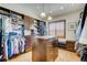 Organized walk-in closet with custom shelving and ample storage space at 9451 Desert Willow Trl, Highlands Ranch, CO 80129
