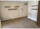 Bedroom area with shelving and carpeting at 13601 E Marina Dr # 305, Aurora, CO 80014