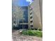 Apartment building with large front windows and well-maintained lawn at 13601 E Marina Dr # 305, Aurora, CO 80014