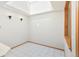 Bright breakfast nook with a skylight, tile flooring, and modern lighting fixtures at 1350 S Idalia St # G, Aurora, CO 80017