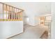 Spacious living room with access to the kitchen, fireplace, staircase and side entry door at 1350 S Idalia St # G, Aurora, CO 80017