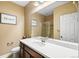 Clean basement bathroom with vanity, sink, and shower at 12551 Tamarac St, Thornton, CO 80602