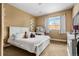 Spacious basement bedroom with plush bedding and ample closet space at 12551 Tamarac St, Thornton, CO 80602