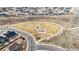 Aerial view of a well maintained community park with walking trails and playground at 12551 Tamarac St, Thornton, CO 80602