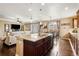 Modern kitchen with granite countertops and stainless steel appliances at 12551 Tamarac St, Thornton, CO 80602