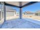 Covered patio with a view of neighboring homes, showcasing outdoor living space at 22097 E Rockinghorse Pkwy, Aurora, CO 80016