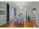 Bright dining area with hardwood floors at 3613 Julian St, Denver, CO 80211