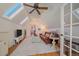 Living space features skylights, a ceiling fan and an adjacent seating area at 3613 Julian St, Denver, CO 80211