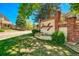 Attractive brick and stone sign welcomes you to the Barclay Condominiums community under mature shade trees at 4760 S Wadsworth Blvd # 302, Littleton, CO 80123