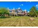 Beautiful multi-story apartment building with well-maintained landscaping at 4760 S Wadsworth Blvd # 302, Littleton, CO 80123