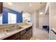 Kitchen featuring an eat-in bar that opens to the living area, perfect for entertaining and socializing at 4760 S Wadsworth Blvd # 302, Littleton, CO 80123