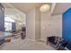 Bright living room with high ceilings, large windows, and comfortable seating at 4760 S Wadsworth Blvd # 302, Littleton, CO 80123