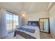 Bright main bedroom with sliding glass door to private balcony at 4760 S Wadsworth Blvd # 302, Littleton, CO 80123
