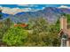 Enjoy serene views of the mountains and lush treetops from the comfort of your home at 4760 S Wadsworth Blvd # 302, Littleton, CO 80123