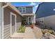 Charming home with meticulously landscaped walkway, leading to a quaint front porch and inviting entryway at 11062 Gaylord St, Northglenn, CO 80233
