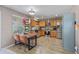 Spacious kitchen with modern appliances, ample countertop space, and an adjacent dining area at 11062 Gaylord St, Northglenn, CO 80233