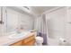 Functional bathroom with a vanity, toilet, and shower-tub combination at 2560 Concord Cir, Lafayette, CO 80026