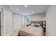 Cozy bedroom with neutral walls, carpet, and a queen size bed at 2560 Concord Cir, Lafayette, CO 80026