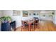 Dining room with a rustic wooden table and modern wine storage, creating a stylish and functional space at 2560 Concord Cir, Lafayette, CO 80026