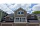 Beautiful exterior of a two-story house with a balcony, multiple windows, and a garage at 2560 Concord Cir, Lafayette, CO 80026
