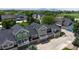 An aerial view of the townhomes showcasing its color schemes and exterior appeal at 2560 Concord Cir, Lafayette, CO 80026