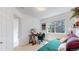 Bright home office with comfortable green futon and a large window at 2560 Concord Cir, Lafayette, CO 80026