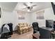 Basement bedroom with ceiling fan and neutral decor at 2612 Meadowbrook Dr, Denver, CO 80221