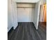 Large walk-in closet with double doors and hanging rod at 17437 E Rice Cir # B, Aurora, CO 80015