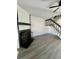 Living room with gray flooring, fireplace, and ceiling fan at 17437 E Rice Cir # B, Aurora, CO 80015