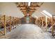 Spacious unfinished attic with exposed wood beams, offering ample storage potential at 1194 Camp Eden Rd, Golden, CO 80403