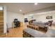 Finished basement with a flexible layout, featuring a workspace and entertainment area at 1194 Camp Eden Rd, Golden, CO 80403