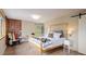 Bright bedroom with a comfortable bed, stylish decor, and natural light from the window at 1194 Camp Eden Rd, Golden, CO 80403