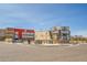 Front of Ziggi's Coffee shop along with a self-storage building and parking lot at 11845 Mobile St, Commerce City, CO 80022