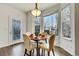 Dining area with adjacent windows to the exterior at 11845 Mobile St, Commerce City, CO 80022