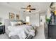 Elegant primary bedroom with tray ceilings and decorative elements at 11845 Mobile St, Commerce City, CO 80022