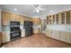 Spacious kitchen with stainless appliances, quartz countertops, gas range, recessed lighting, and wood cabinets at 32501 E 137Th Way, Brighton, CO 80603