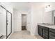 Modern bathroom boasts granite countertops, sleek vanity, and glass shower at 9264 Biscay St, Commerce City, CO 80022